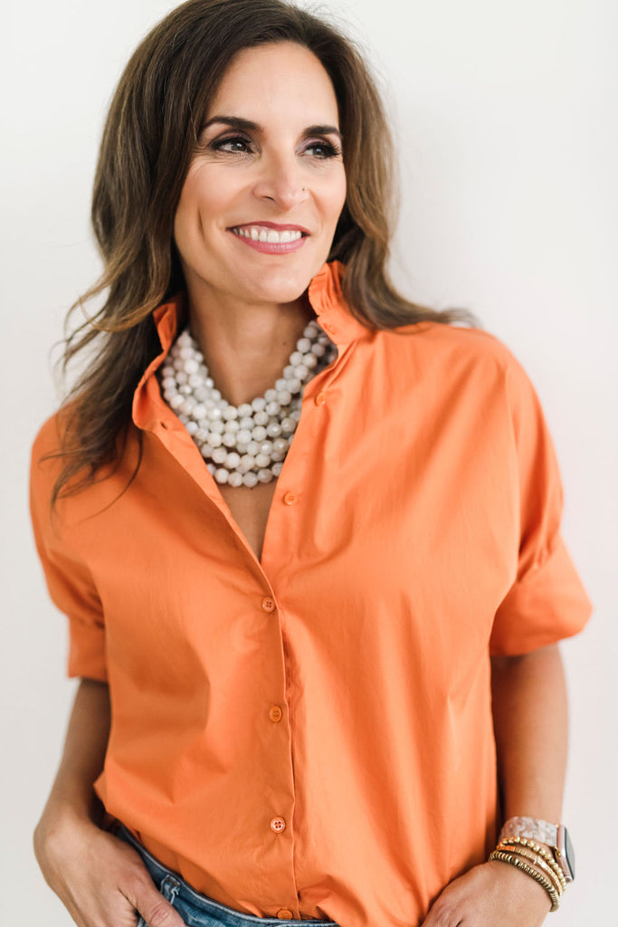 orange ruffle sleeve top