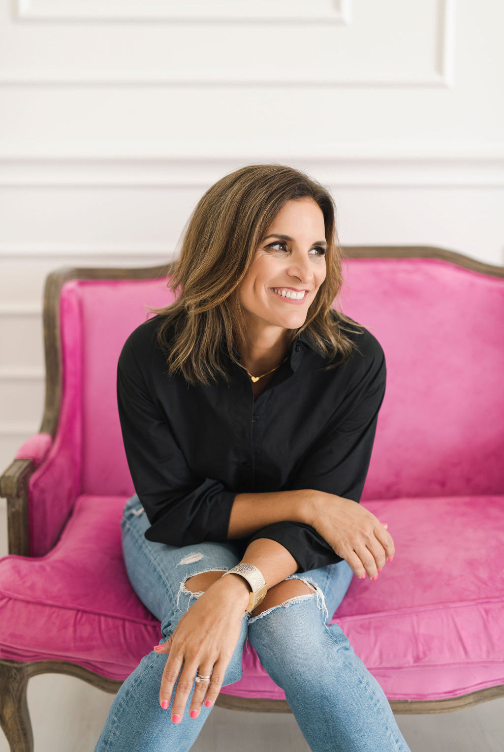 Crisp and classic women's button down shirt in black.