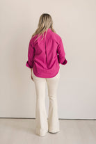 Women's Ruffle collar button down shirt in Berry pink.
