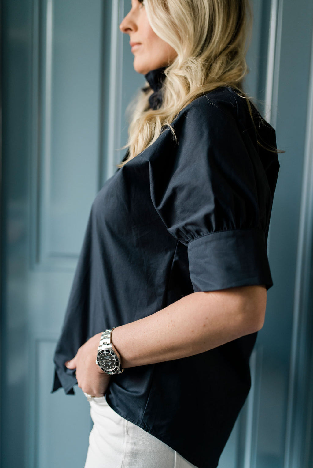 Crisp button down women's shirt with a ruffle collar in Navy blue.