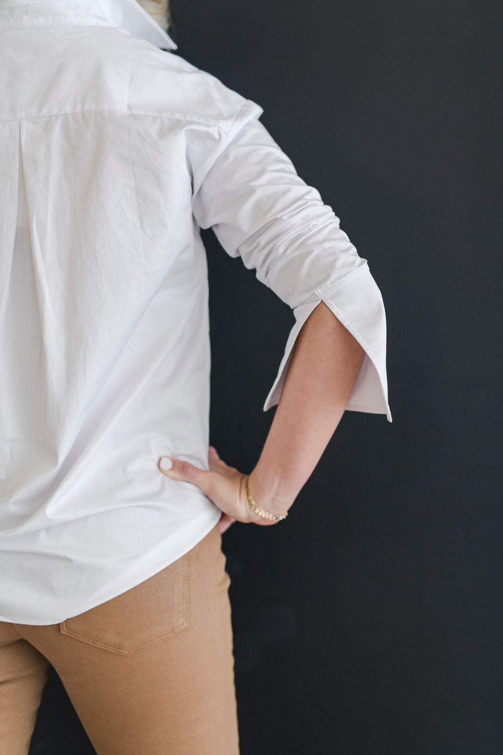 Split large cuff on a classic white shirt.
