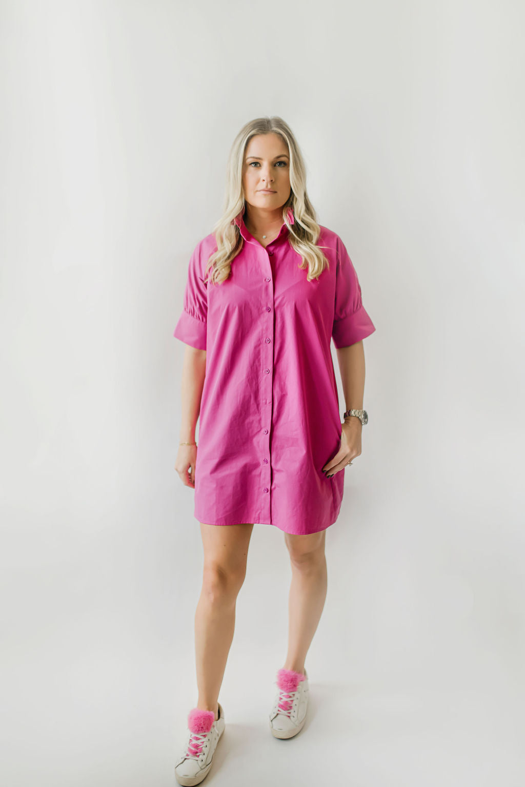 Berry pink women's button down dress with short sleeves and a ruffle collar.